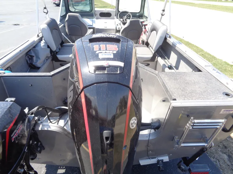 Slide: The Image of 2017 Crestliner CCM185 boat interior with Mercury 115 outboard motor. - 18