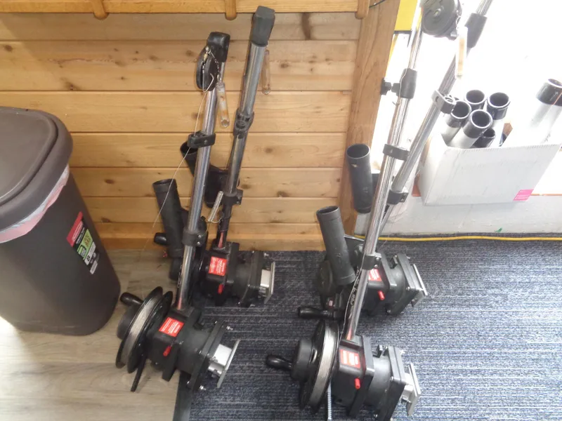 Slide: The Image of Fishing downriggers and rods in a wooden cabin, Crestliner CCM185, 2017 model. - 20