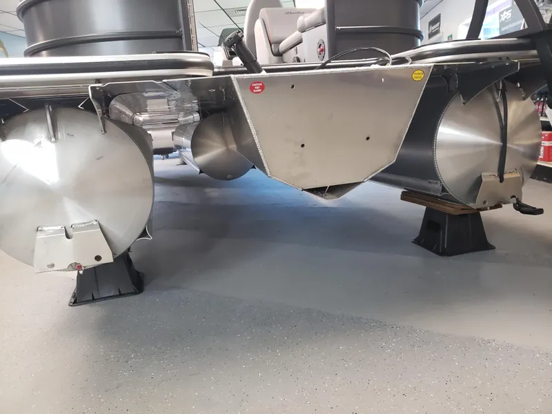 Slide: The Image of 2025 Bentley Pontoons Legacy Navigator undercarriage on display in showroom. - 10