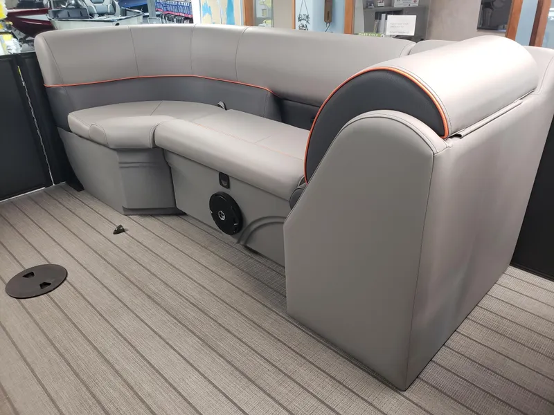 Slide: The Image of 2025 Bentley Pontoons Legacy Navigator interior with sleek gray seating and modern design. - 11