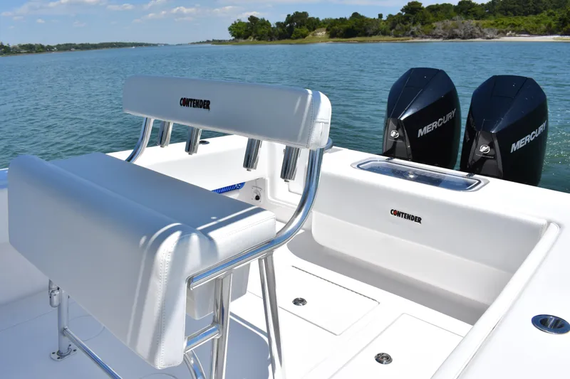Slide: The Image of 2024 Contender 28 Tournament boat with dual Mercury engines on a sunny day. - 20