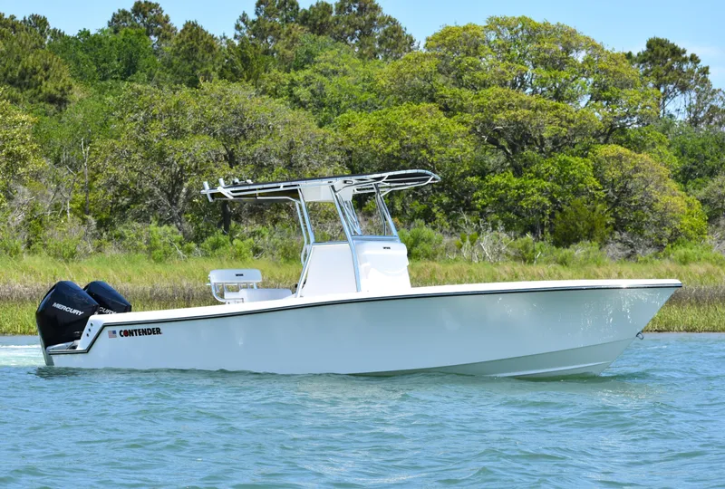 Slide: The Image of 2024 Contender 28 Tournament boat on water, featuring sleek design and dual engines. - 5