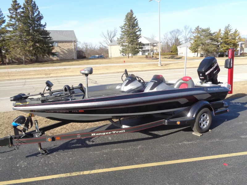 Slide: The Image of 2007 Ranger 188DVS fishing boat on trailer, parked outdoors. - 0
