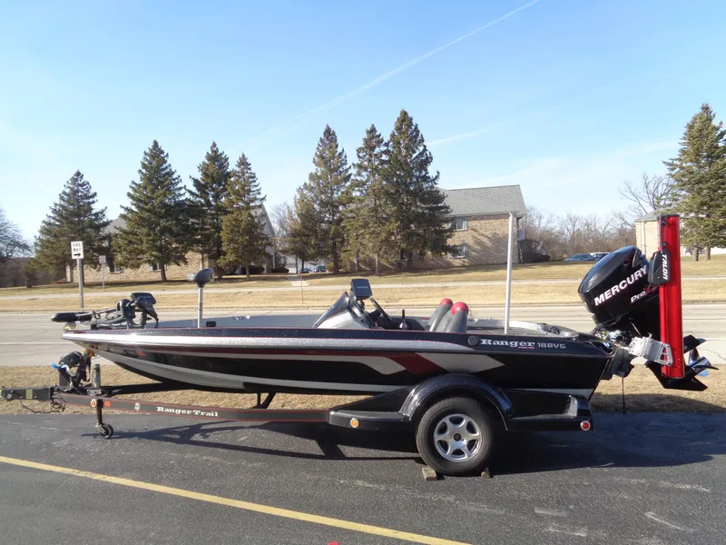 Slide: The Image of 2007 Ranger 188DVS boat on trailer with Mercury engine, parked outdoors. - 1