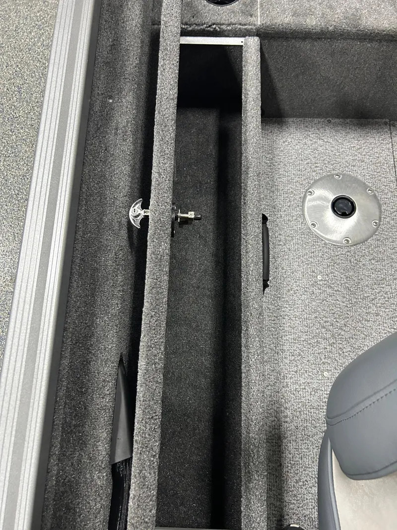 Slide: The Image of 2024 Alumacraft Classic 165 Sport interior with storage compartments and seating. - 10