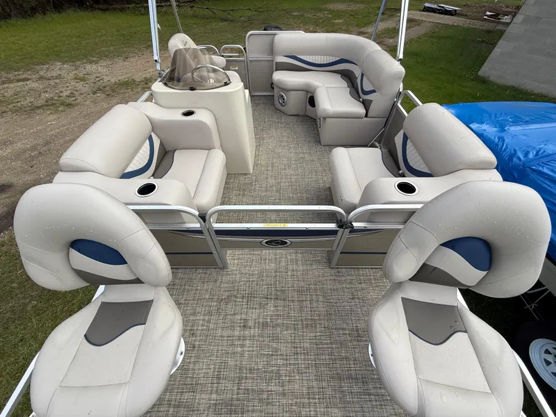 Slide: The Image of 2016 Apex Marine Qwest Adventure 7516 pontoon boat with spacious seating and modern design. - 14