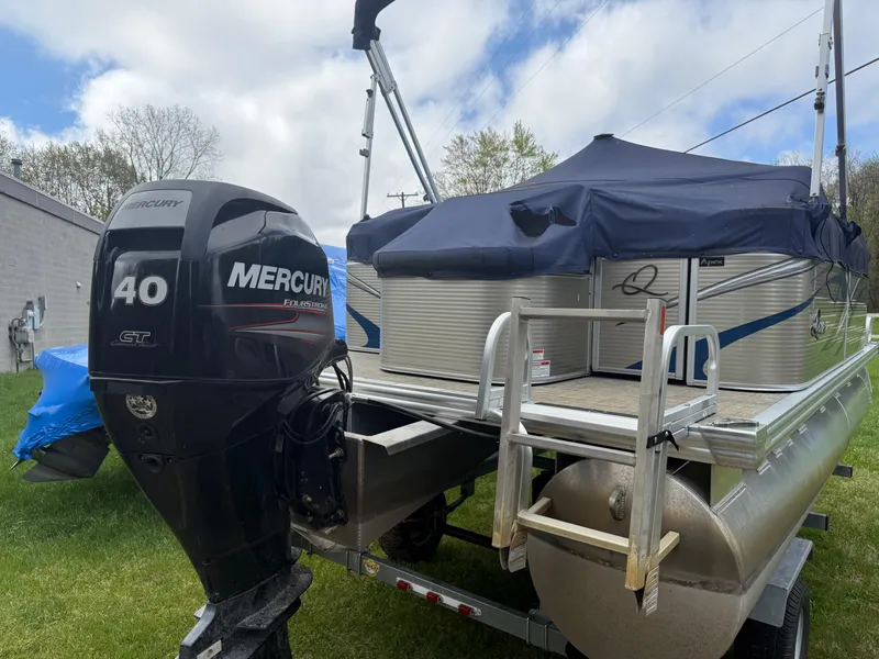 Slide: The Image of 2016 Apex Marine Qwest Adventure 7516 pontoon boat with Mercury 40 HP engine. - 7