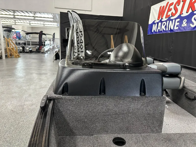 Slide: The Image of 2024 Alumacraft Classic 165 SC boat interior at Westre's Marine & Sport showroom. - 10