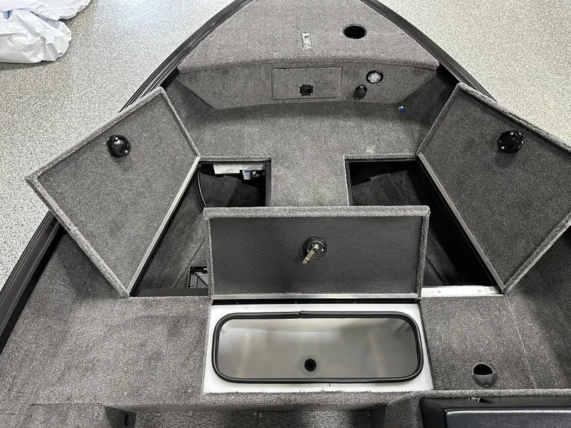 Slide: The Image of 2024 Alumacraft Classic 165 SC boat interior with windshield, displayed at Westre Marine & Sport. - 8