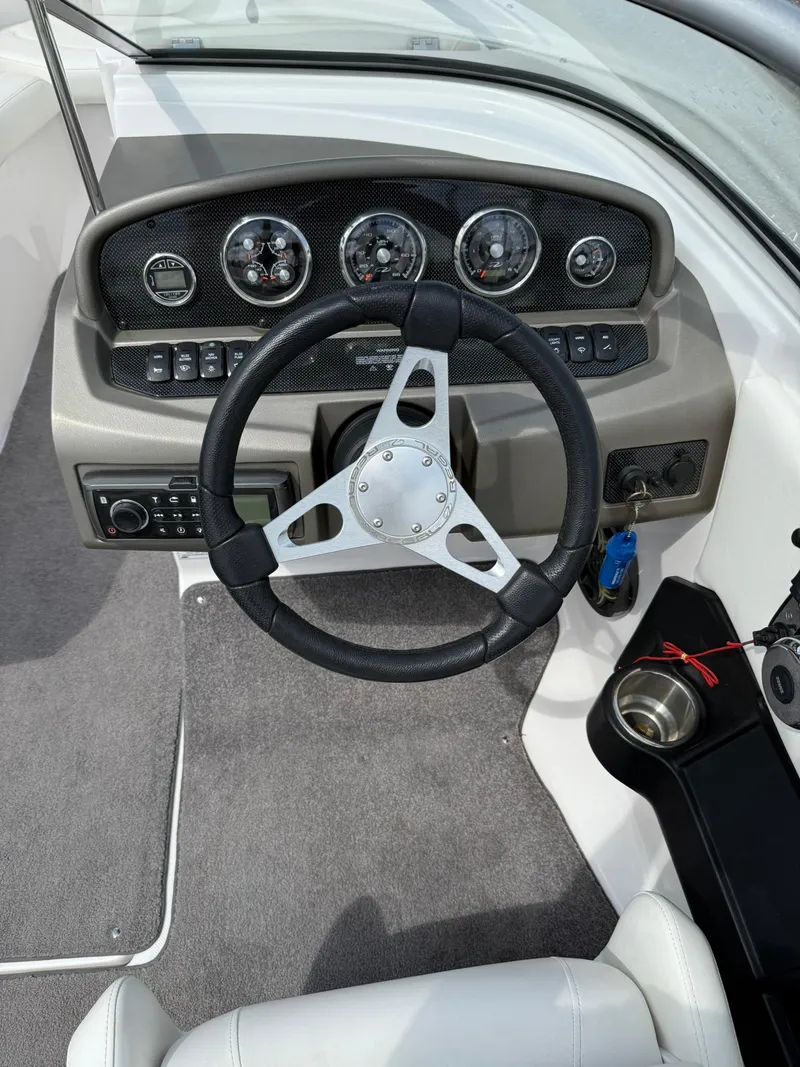 Slide: The Image of 2012 Regal 2000 Bowrider dashboard with steering wheel and instrument panel. - 10