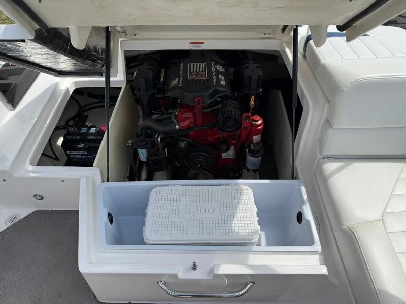 Slide: The Image of 2012 Regal 2000 Bowrider engine compartment with cooler and battery visible. - 14
