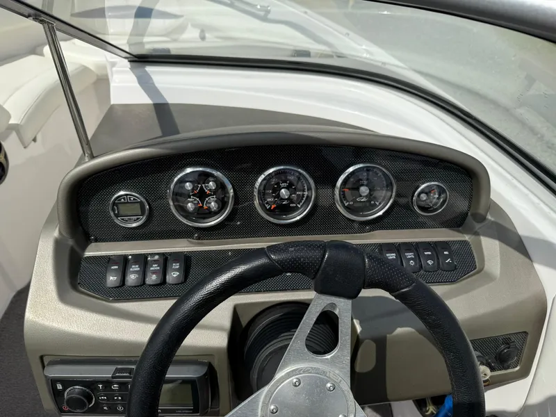 Slide: The Image of 2012 Regal 2000 Bowrider dashboard with steering wheel and instrument panel. - 18