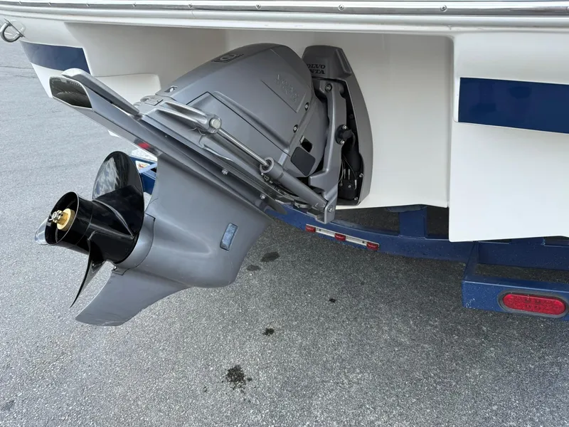 Slide: The Image of 2012 Regal 2000 Bowrider boat stern with outboard motor and propeller. - 5