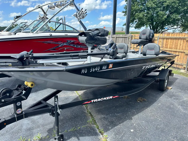 Slide: The Image of 2023 Tracker 175 Pro Team fishing boat on trailer, parked outdoors. - 10