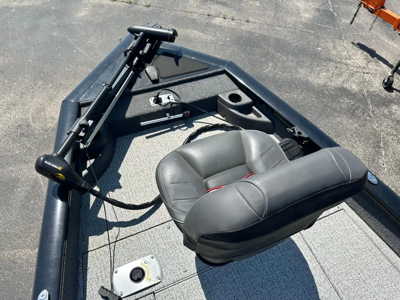 Slide: The Image of 2023 Tracker 175 Pro Team boat with gray seating and trolling motor. - 6