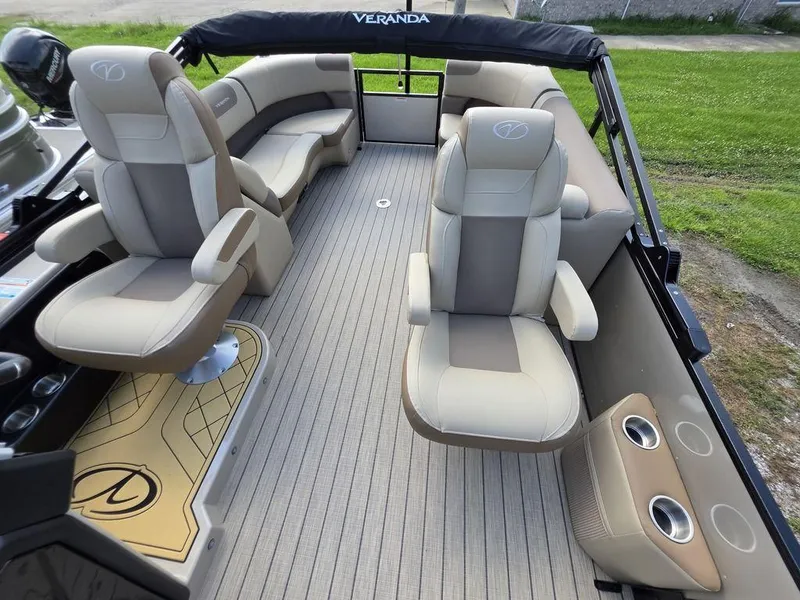 Slide: The Image of Luxurious 2025 Veranda VR22RC XL Tri-Toon interior with plush seating and modern design. - 15