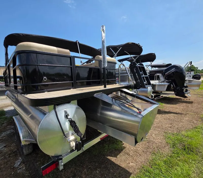 Slide: The Image of 2025 Veranda VR22RC XL Tri-Toon boat on trailer, sunny day, rear view. - 3