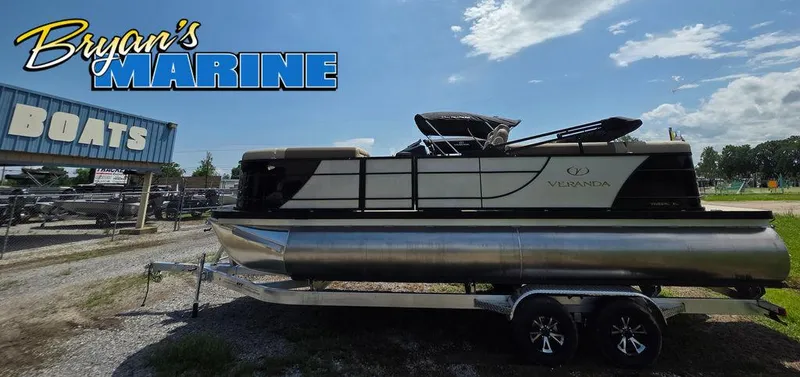 Slide: The Image of 2025 Veranda VR22RC XL Tri-Toon boat on trailer at Bryan's Marine dealership. - 4