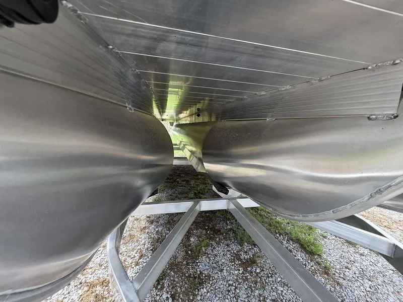 Slide: The Image of Underneath view of 2025 Veranda VR22RC XL Tri-Toon, showcasing aluminum pontoons. - 45