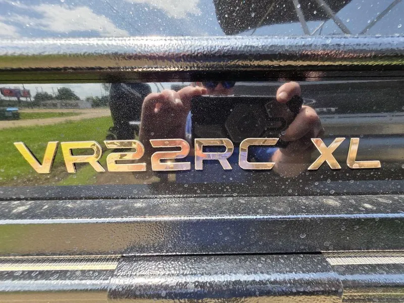 Slide: The Image of 2025 Veranda VR22RC XL Tri-Toon logo on reflective surface. - 5