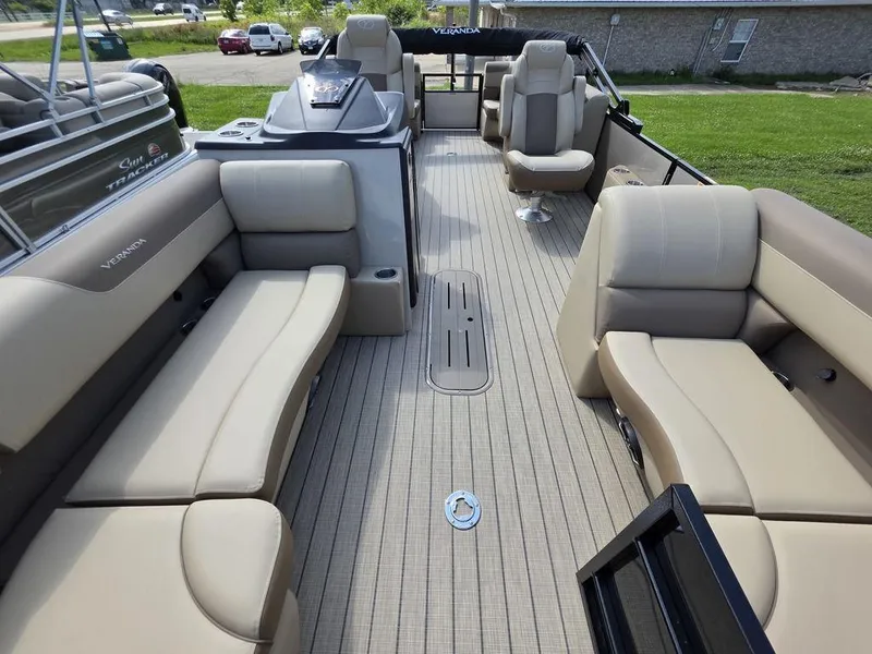 Slide: The Image of 2025 Veranda VR22RC XL Tri-Toon with spacious seating and modern design on a sunny day. - 8