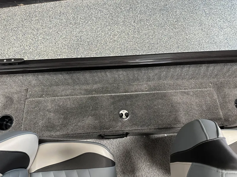 Slide: The Image of 2024 Alumacraft Classic 165 SC interior with gray carpet and seating detail. - 10