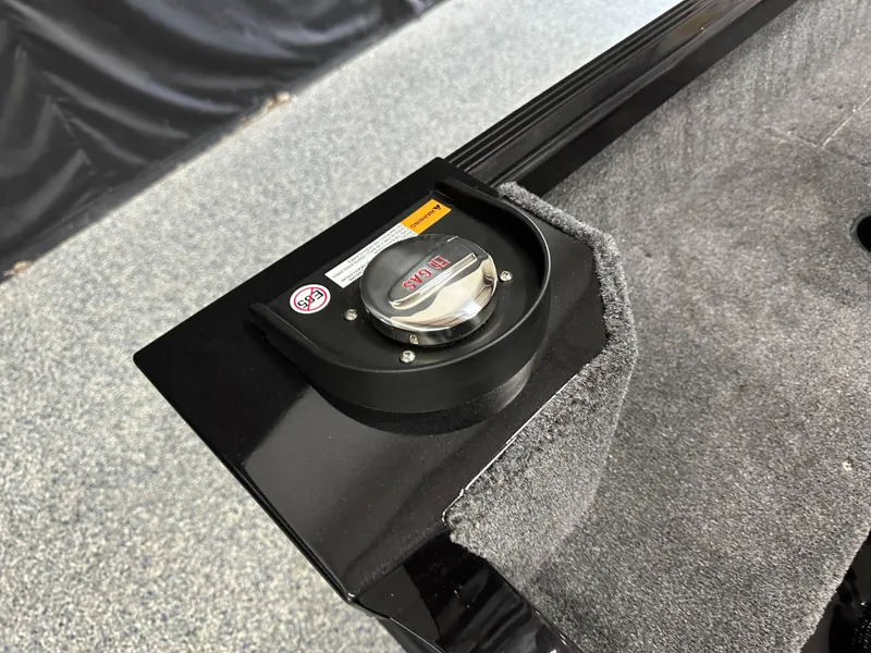 Slide: The Image of Fuel cap on 2024 Alumacraft Classic 165 SC boat, featuring a sleek design. - 16