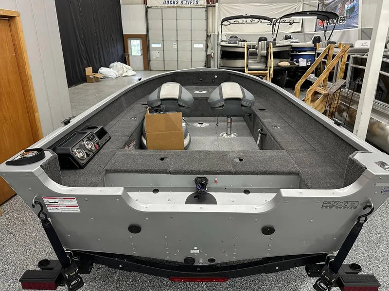 Slide: The Image of 2024 Alumacraft Classic 165 Tiller boat with certification sticker and serial number plate. - 17