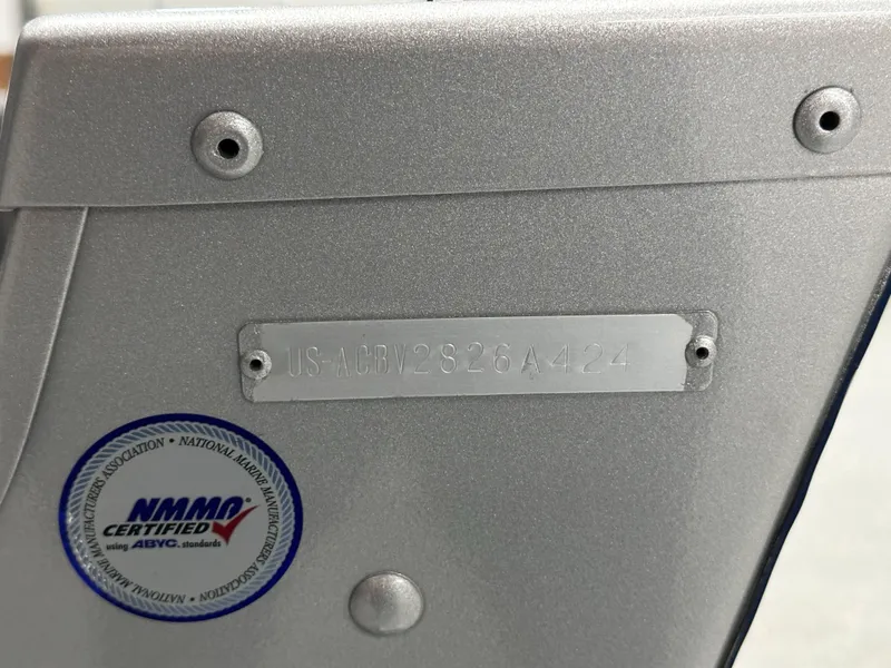 Slide: The Image of 2024 Alumacraft Classic 165 Tiller boat with NMMA certification and serial number plate. - 17