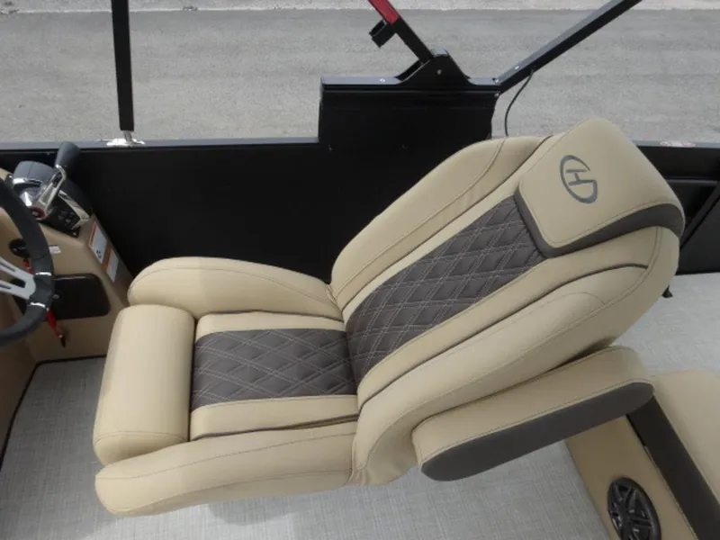 Slide: The Image of 2023 Harris Sunliner 230 boat seat with beige and gray upholstery, featuring diamond stitching. - 14