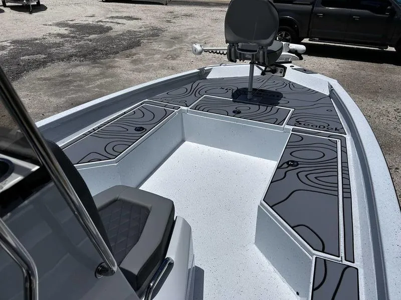 Slide: The Image of 2025 Xpress H22B boat interior with sleek design and modern seating. - 9