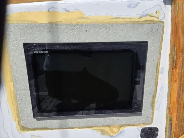 Slide: The Image of Furuno marine display on 1978 Formosa 46 yacht dashboard. - 15