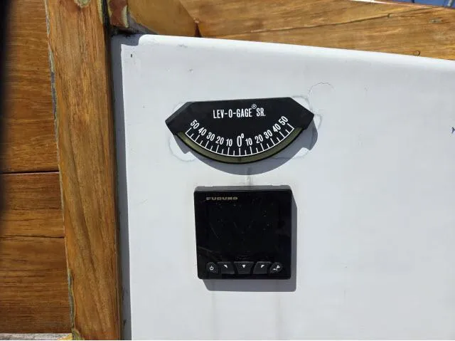 Slide: The Image of Incline gauge and control panel on 1978 Formosa 46 boat dashboard. - 16