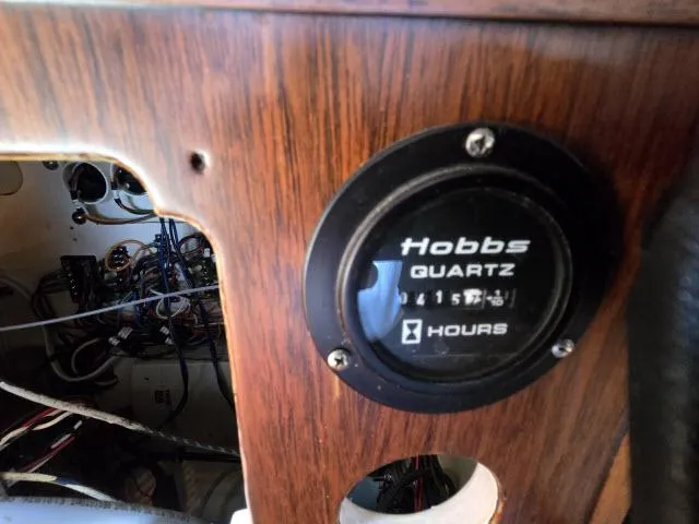 Slide: The Image of Hobbs Quartz hour meter on 1978 Formosa 46 boat dashboard, showing 1157 hours. - 25