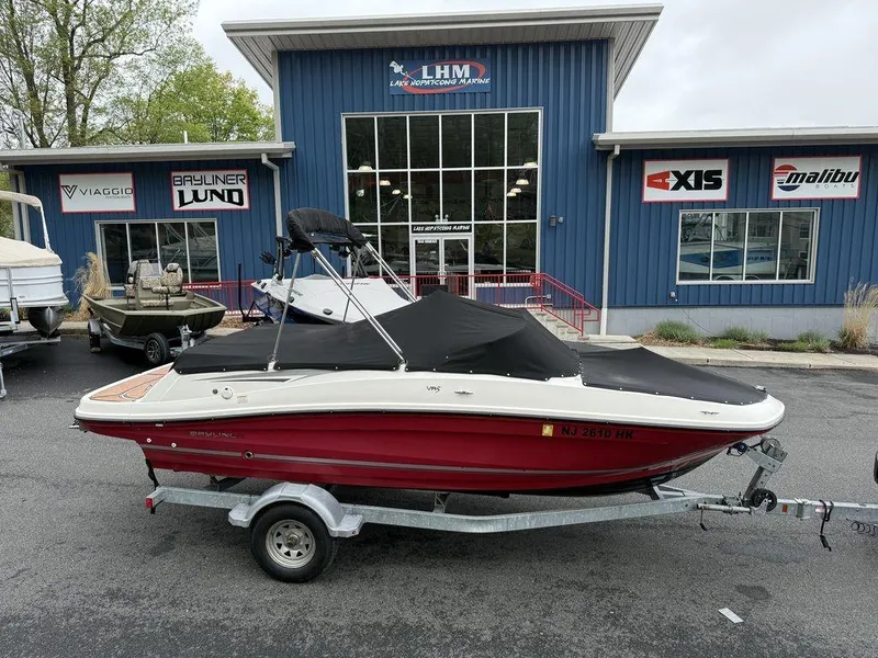 Slide: The Image of 2016 Bayliner VR5 Bowrider boat on trailer outside dealership. - 18