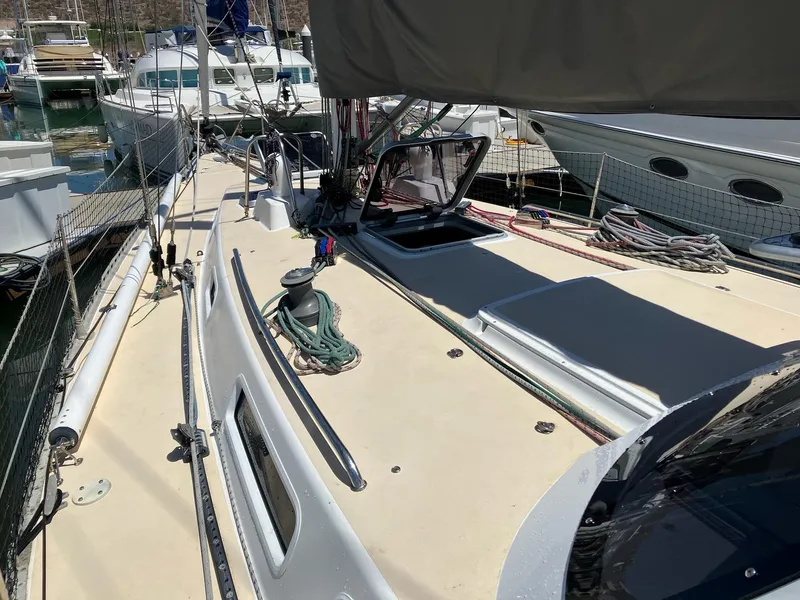 Slide: The Image of Sailboat deck of 1998 J Boats J 42, docked with open hatch and rigging. - 5