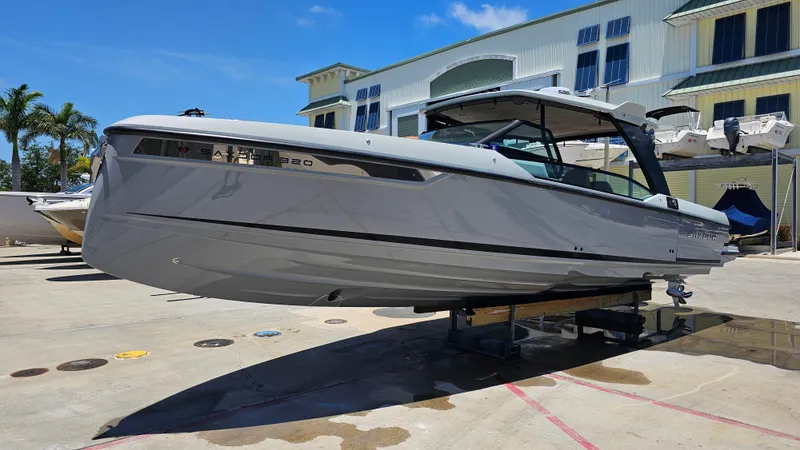Slide: The Image of 2023 Saxdor 320 GTO boat displayed outdoors on a sunny day. - 35