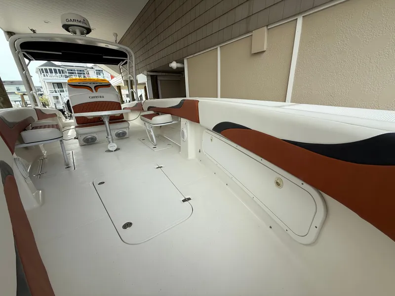 Slide: The Image of 2007 Carrera Boats 36 Center Console with spacious deck and modern seating. - 21