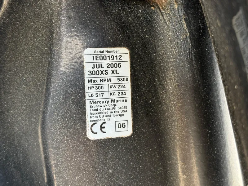 Slide: The Image of Label on a 2007 Carrera Boats 36 Center Console, detailing engine specifications and serial number. - 37