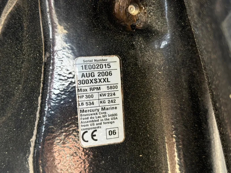 Slide: The Image of Label on a 2007 Carrera Boats 36 Center Console, showing Mercury Marine engine details. - 38