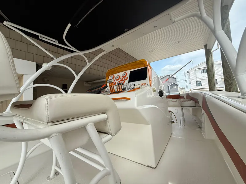 Slide: The Image of 2007 Carrera Boats 36 Center Console interior with helm and seating, showcasing modern design. - 6