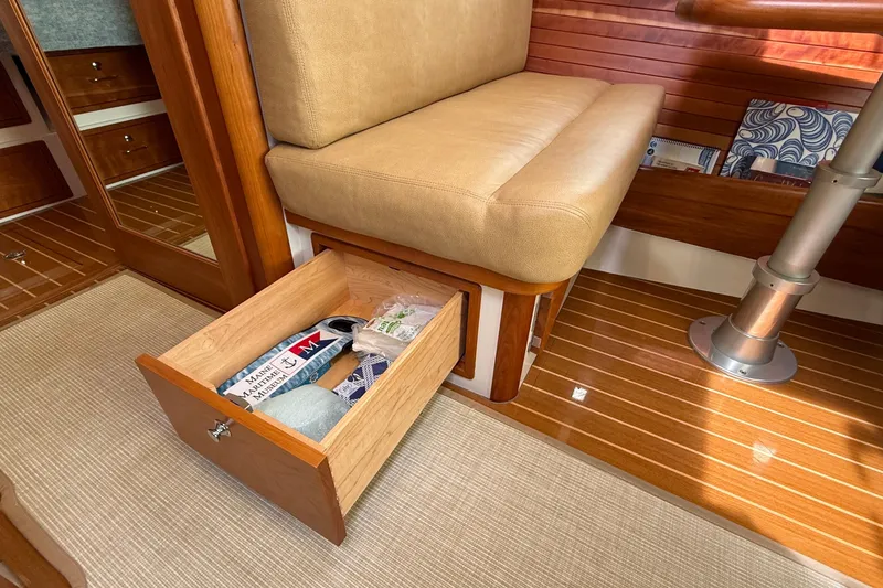 Slide: The Image of Interior of 2016 MJM 40z Downeast boat with open storage drawer under seat. - 24
