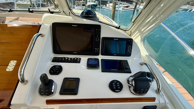 Slide: The Image of Helm of the 2016 MJM 40z Downeast with modern navigation equipment. - 17