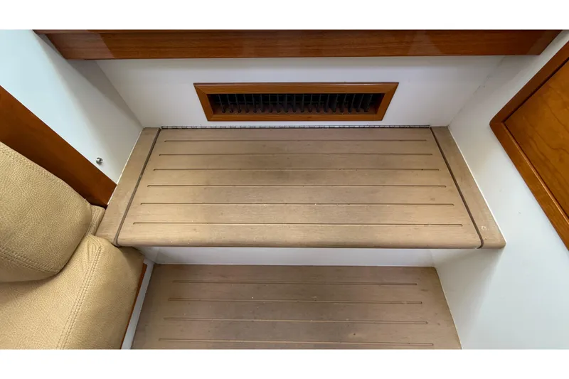 Slide: The Image of Interior step of 2016 MJM 40z Downeast boat, featuring wood finish and vent. - 61