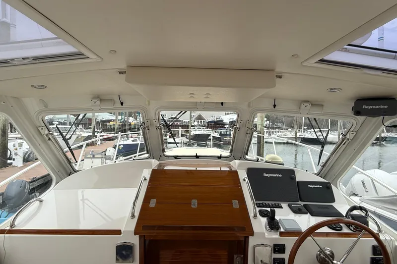 Slide: The Image of Interior view of 2016 MJM 40z Downeast yacht cockpit with Raymarine navigation equipment. - 11
