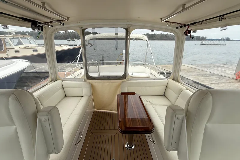 Slide: The Image of Interior of 2016 MJM 40z Downeast yacht with elegant seating and wooden table. - 14