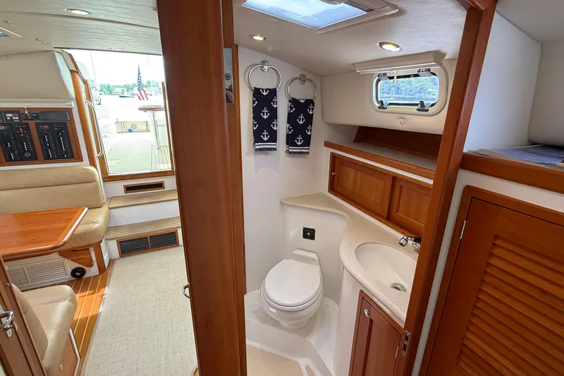 Slide: The Image of Interior of 2016 MJM 40z Downeast yacht featuring bathroom and seating area. - 49