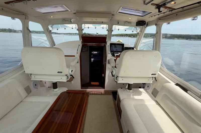 Slide: The Image of Interior of 2016 MJM 40z Downeast yacht with helm and seating area. - 10
