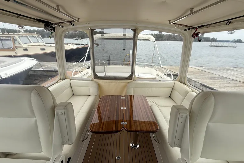 Slide: The Image of Interior of 2016 MJM 40z Downeast yacht with elegant seating and wooden table. - 13