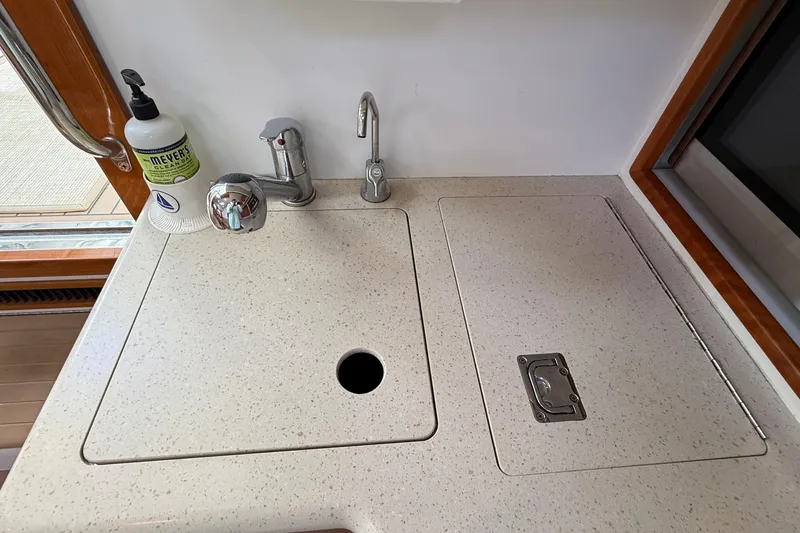 Slide: The Image of 2016 MJM 40z Downeast yacht galley sink with faucet and countertop. - 38